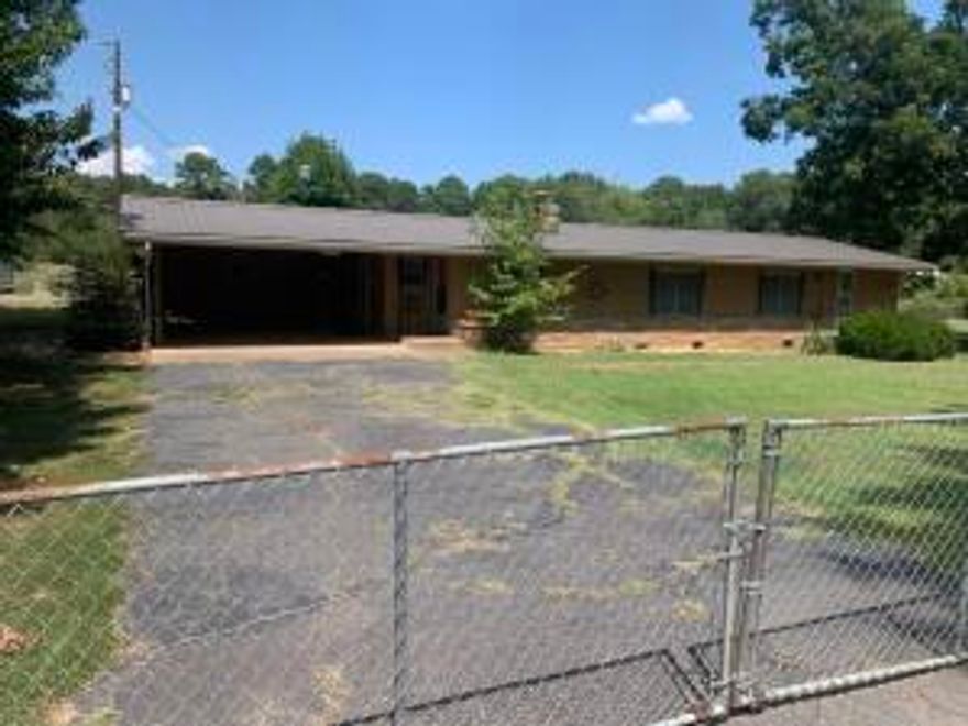 Don't miss out on this amazing opportunity! Tucked away in the beautiful Carter Cove community and just a short drive from Plainview. This 2 bed 2 bath sports a nice open yard consisting of 8 combined lots! The house has a back porch great for sipping coffee or reading a book with a separate BBQ pit.  Just around an hour away you can drive to down town Hot Springs and get some of the refreshing spring water!