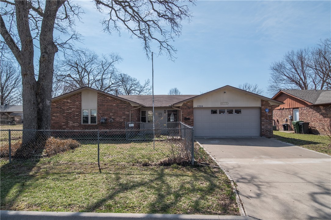 Well kept and clean 3 bed, 2 bath home with inviting heated & cooled sunroom. Gutters with new leaf guards. Kitchen fridge, garage fridge, washer, dryer and garage shelving all convey. Close proximity to downtown Rogers (dining shopping, entertainment). Please see supplements regarding slab condition. Please set expiration date on offers for Wednesday 3/16 at 5:00. Non-occupant owner, no SPD will be provided. Sold As Is.