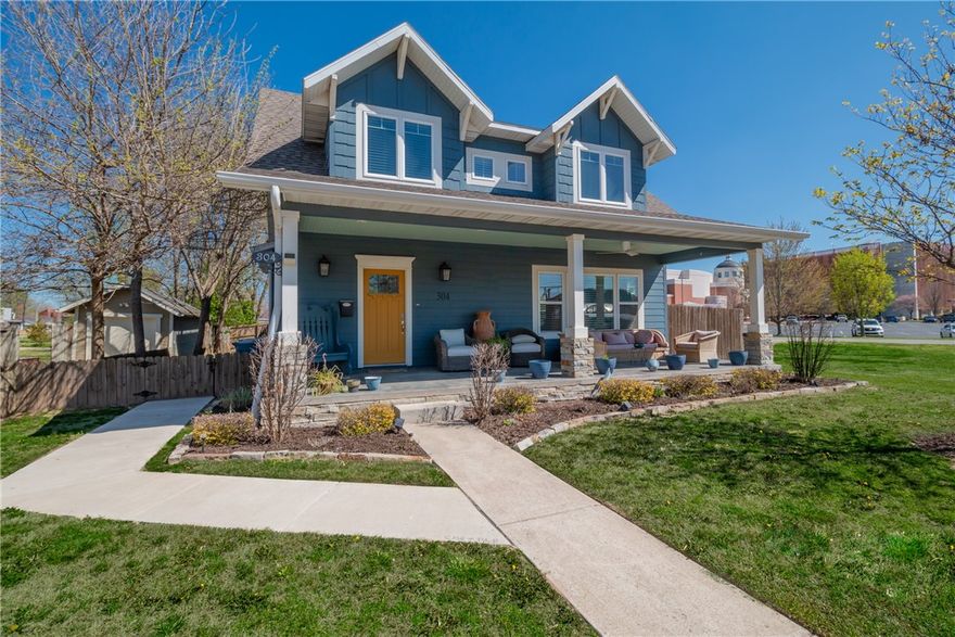 Enjoy the best of Downtown Bentonville Living in this Craftsman-Style Home on large lot! Just 1 block from the Bentonville Square, this urban style farmhouse boasts highly desired open concept living design capturing the perfect blend of old charm and modern new features.  Built in 2017, this 4-bedroom, 2.5-bathroom home features an open layout with wooden beams, quartz countertops throughout, gas cook-top, custom lighting, wainscotting, built-ins & more.  Main level features two large Living Rooms, eat-in kitchen with island, large laundry/mud room with sink. Upstairs is very private with primary suite and bathroom with an additional 3 bedrooms and bathroom! Enjoy the serenity of your private back yard perfect for entertaining with pergola and green space with hard to find large 3 car detached garage. Only a minute walk to Downtown Bentonville square to enjoy all the entertainment, dining, shopping, trails and more. Bentonville Schools