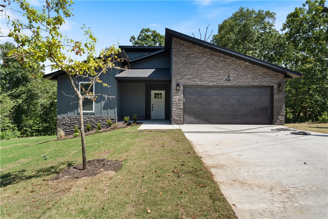 Located on a private Cul-de-Sac this home features modern styling with an open living feel. This new construction 3 bedroom 2 bath home with upgrades is a must see. The home includes a large back deck for entertaining and overlooks the private back yard. The primary suite boasts a spacious bath with large closet and custom shower. Quartz countertops, custom cabinets and LVP flooring throughout. 10 year extended Quality Builders Warranty included.