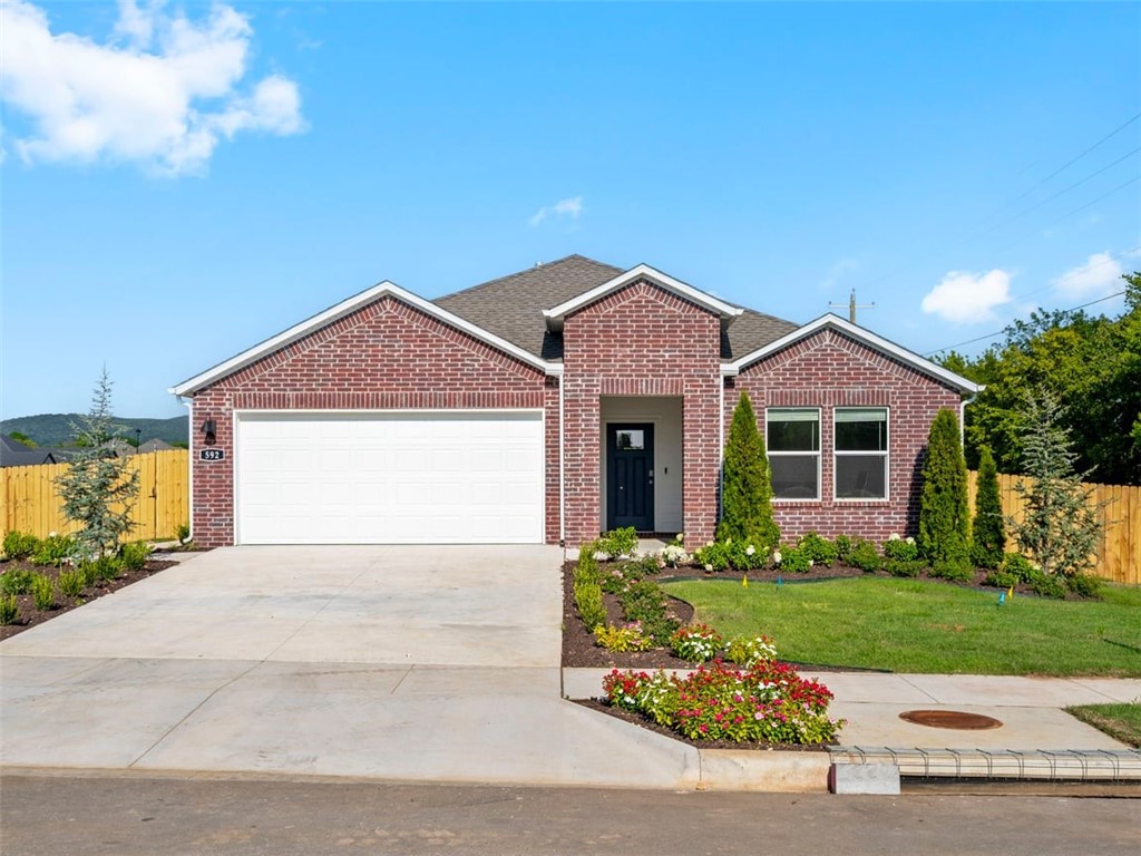 Exquisite Elgin Plan in Wagon Wheel Phase 2, in Farmington, Arkansas! Each home in Wagon Wheel is meticulously crafted with attention to detail, creating a space that feels both luxurious and welcoming. From the moment you walk through the door, you'll be greeted by modern features and spacious a layout that caters to every lifestyle. Our homes boast premium finishes and thoughtful designs, ensuring that you'll be stepping inside your own personal oasis. These homes will be complete with LVP flooring throughout and wood shelving in all closets, pantry and utility room. The kitchen will have quartz kitchen counters, 36-inch cabinets, and stainless-steel appliances! Home will have a Garage Door Opener. Primary bath will have quartz countertops, double sinks, and an oversized walk-in shower. Each home comes with 4-sided brick with Hardie ® per plan. Taxes and Parcel TBD.