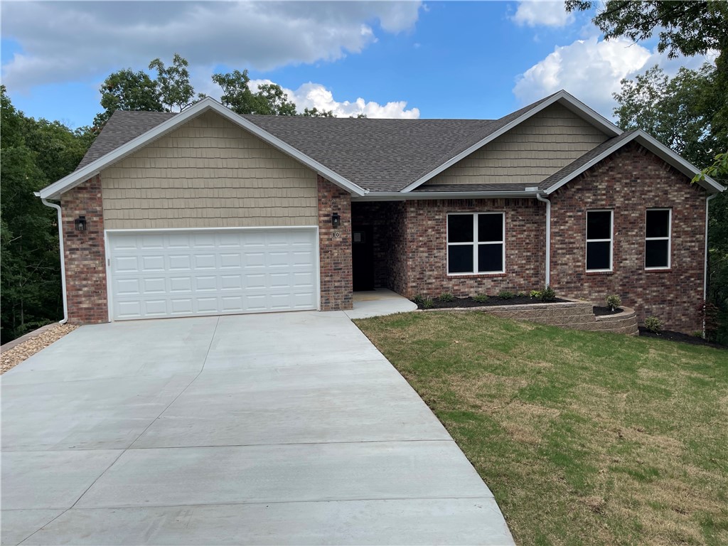 2,800 SF 3BR, 3BATH NEW HOME WITH 420 SF WORKSHOP AND 3 LOTS TOTALING 1.21 ACRES.
NEW BELLA VISTA HOME JUST COMPLETED. First level offers Great room with 12ā vaulted ceiling, 2
6āx6ā energy saving windows and floor to ceiling fireplace. Large kitchen with Frigidaire appliances
and granite countertops and large eat-in dining area. 3 BRās and 2 baths complete living area on this
level.
Lower level contains a 2 nd Great room with FP, another large bonus room and full bath. Additionally, a
420 SF workshop with concrete floor and sheetrock offers opportunities for hobbies or business. This
home offers almost complete privacy with a lot on each side included in the offering. Beautiful views
of wooded mountain to the rear of property can be enjoyed from almost any room.