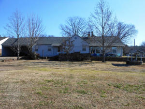 Have a house full of kids, need room for two families or mother in law quarters; this is the home for you ( 6 or more bedrooms, 3 or more baths). Great shape energy efficient, good location (nearby new school complex, 5 minutes from Lake Nimrod & Natl Forest, Twenty Five miles from Russellville, all city services, convenience store, health clinic, pharmacy, etc.). Approx $17/sq ft Heated & Cooled.