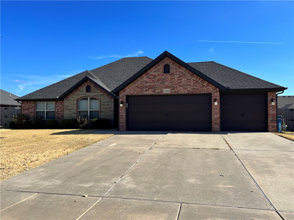 Stunning 3BR/2BA/3CA home for rent in super convenient Bentonville location. Live your best life in this one-level, split plan with a spacious bedrooms and tons of living space. Huge living room with hardwood flooring, vaulted ceiling w/ wood beams, & gas log fireplace. Or take it out to the enclosed sunroom or patio for 4-season and outdoor living. The gorgeous eat-in kitchen w/ 3cm granite counters, tiled back-splash, ss appliances & pantry is to die for! Primary suite includes separate dual vanities and closets, tiled shower, whirlpool tub. Other extras include wood blinds, wood privacy fence. Refrigerator, washer and dryer included. Walking distance to the new Creekside Park. No Pets.
