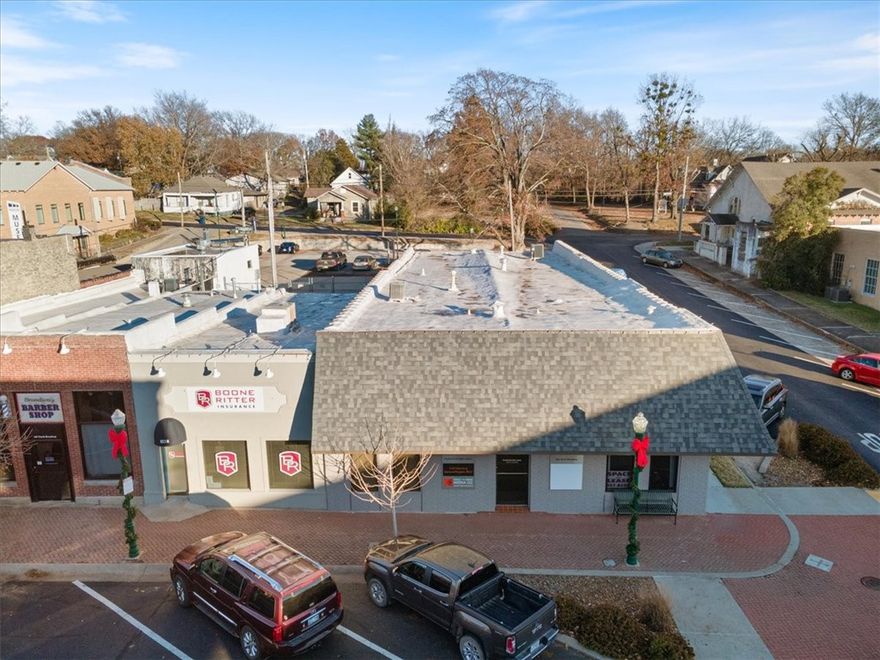 Amazing opportunity to own TWO buildings in downtown Siloam Springs! Current monthly rent for 101/103 is $4,390 !  101 N Broadway sits on a corner lot with parking on the side, in the front, and in back, incl private parking areas in the back. Building features multiple office spaces (12), a conference room, kitchen, 2 restrooms, and additional storage rooms.  Has a brand new roof (2023) and outside was painted in 2023. Entryway features secure keypad entrance for tenants/owners. Has been very well maintained. Recently used as office spaces and recording studio. This building features 4400 sq ft, and has a front entrance and back door entrance with a security light out back exit. Building at 103 N Broadway is currently tenant leased as an insurance office.  (No inside pics are shown but has had some recent updating and is very nice-Please don't disturb w/o a showing appt) Has had a lease agreement for several years and intends to stay, if possible. Both bldgs have front and back entrance/exits.