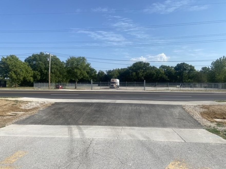 INCOME PRODUCING 2 acre corner lot zoned I-2.  60 Month Lease starting May 2022.
$96,000/year, absolute NNN with continued 2% increases.
New fencing around property with barb wire and gate access onto 15th Street.