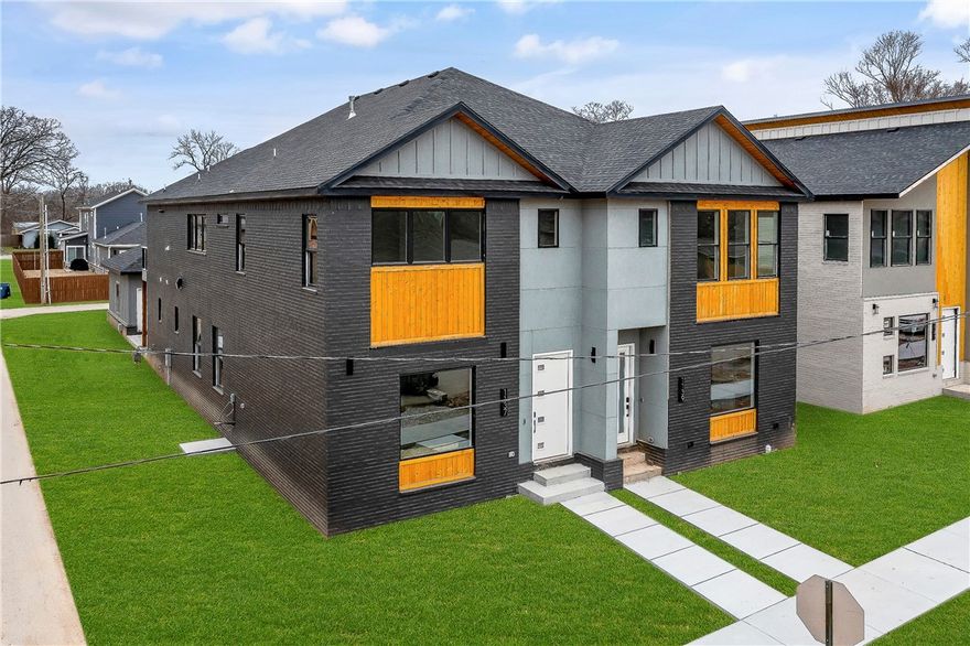 Explore Briartown area surround by mountain bike trails located on the North side of downtown Bentonville. Its an easy walk to Crystal Bridge and the soon to open Airship Coffee House on Main Street. This new single family attached home is bright and open with beautiful design details including a gourmet kitchen. You will love the large island, 72' refrigerator, Cafe' series gas range and large walk-in pantry. This home has a modern design including large format tile in throughout the main floor and wood floors upstairs. In the living room the vertical wood accent walls and asymmetrical entertainment area features a horizontal fireplace. There is a total of 3 bedrooms each with a private ensuite. The bedroom on the main level features oversize glass sliding doors leading out to the private courtyard. Upstairs you have 2 large bedrooms on both sides of the family room. The upstairs back bedroom has access to a quiet balcony area. Available for lease.