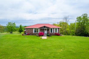 Looking for that perfect Home in the Country With Highway frontage, located almost equally between Branson and Harrison? This Brick home could be your dream home! Home has 3 bedrooms with 3 baths.Master Bedroom is a true Master suite! Kitchen, dining room and Living room has an Open floor plan. Kitchen has custom cabinets, pull out mixer stand and hide-a-way appliance cabinet! Metal roof, newer cooling unit, Reverse Osmosis unit for excellent water. 32 + BEAUTIFUL acres to enjoy! Yr round live spring, Cave PLUS views for miles! Enjoy country living at its best sitting on your screened in porch taking in the breathtaking VIEWS! Home has 2 Pecan trees, 2 apple trees, almond tree, pear tree, apricot tree and black walnut trees. Raised garden beds, one bed with mature asparagus plants!