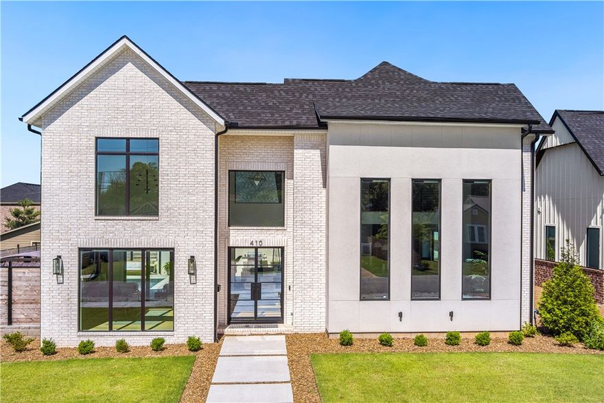 NEW LISTING PRICE IS NOW UNDER APPRAISAL VALUE! Natural light is an understatement! This is an immaculate home right in the heart of downtown Bentonville, close to everything. Fresh and modern finishes with an open floor plan. Four spacious bedrooms, 3 full bathrooms and Primary bath has heated floors. Lots of storage in the kitchen, walk-in butlers pantry, bonus room, 22ft ceilings, hardwood floors, quartz countertops and backsplash. Garage, pool vacuum, oven, shades and thermostat can be operated from your smart phone. The outdoor portion of this home is an absolute oasis, with a brand new Cedar privacy fence. Perfect for entertaining! Brand new landscaping with new sprinkler system installed recently. If Bentonville is where you want to be, walking distance to the Bentonville square, then this home is for you! Welcome Home!!