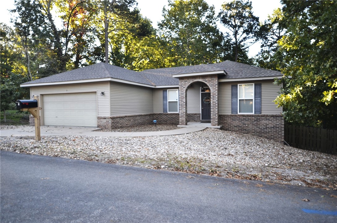 Amazing price point for move-in ready home. Convenient location. This open concept home offers lots of natural light and tall ceilings throughout, located at the top of a friendly cul-de-sac neighborhood less than ½ mile from Hwy 71. Enjoy a sense of nature-rich tranquility in your very own space, while only minutes away from Bella Vistaās extraordinary hiking/biking trails, golf courses, rec centers, and lakes. The split floorplan, open design features a generous sunroom with oversized south-facing windows, seamlessly flowing into the living and kitchen areas. The sunroom and back deck each deliver a wonderful treehouse-like view. Fenced backyard, with cedar privacy fencing facing the road, and black chain link along the back side of the property, blending nicely with the woods beyond. Very convenient access to all of NW Arkansasās business, shopping, dining, entertainment, and vibrant outdoor lifestyle. Gas log fireplace. Office/flex room currently used as 3rd bedroom. New roof in 2020. Bentonville schools.