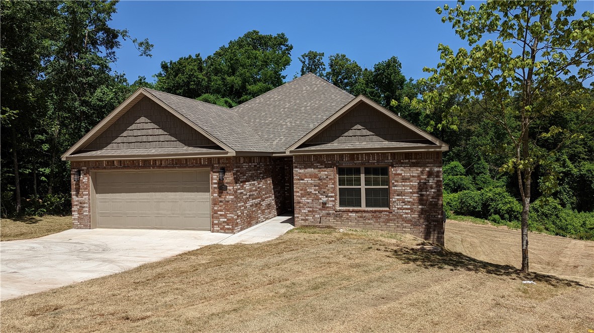 Built in 2022, this 4-bedroom, 2-bath home at 7 Ripley Lane offers a modern open layout with a bright living area and a functional kitchen equipped with a refrigerator and dishwasher. Conveniently located in the heart of Bella Vista, this property provides quick access to I-49 for an easy drive to Bentonville and Rogers. Nearby amenities include Lake Avalon, Lake Windsor, Lake Ann, and golf courses such as Kingswood and Berksdale. Outdoor recreation options are abundant with close proximity to the Back 40 and Blowing Springs trail systems. Shopping, dining, and daily conveniences are also located just minutes away
