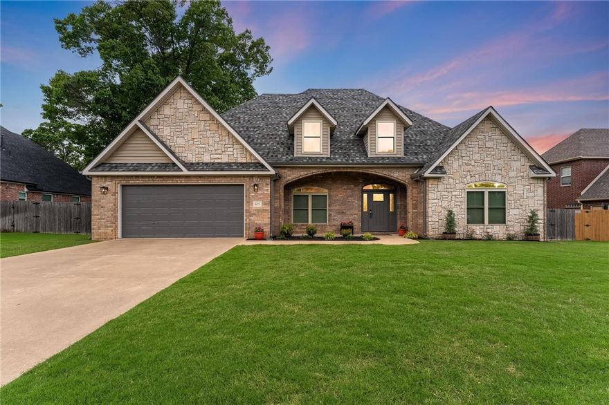 Location! Offering mature trees & home to Applegate Trail Head! Seamless connection to Coler Mountain Bike Preserve, home to Airship Coffee & miles of bike & foot paths. Close to Walmart Campus, Bentonville Community Center & restaurants. Short walk/bike ride to 8th St Gateway Park & Sky Bridge-completed 2026. It will have amenities beyond compare to parks through the city. Downtown Bentonville minutes away. Many updates on this turn-key home. Included are fresh paint throughout, new flooring, new quartz countertops, new microwave, lighting & new faucets. Solid construction of home updated with new roof, gutters, downspouts, front & back fiberglass doors & HVAC units. Primary & secondary bed on main level.  2nd bed has attached bath & would be perfect for office. The closet has been converted to Kevlar storm shelter. Upstairs are 2BR with jacknjill bath with full size separate vanities & walkin closets. Back deck for cookouts on a Big Green Egg! Catch sunsets overlooking .71 acres with 16x20 shed! Won't last long!