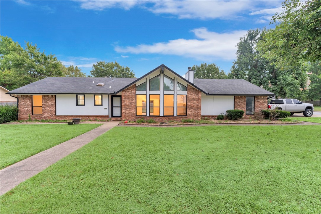 Welcome to this beautifully maintained home sitting on a large corner lot that offers both space and curb appeal. Step inside to a bright and inviting living room filled with natural light from the gorgeous, oversized windows—perfect for relaxing or entertaining.
You'll love cozy evenings by the fireplace, and appreciate the modern updates throughout, including updated light fixtures and ceiling fans. The guest bathroom has been stylishly remodeled, adding a fresh and contemporary touch.
Step out back and enjoy a covered patio, ideal for BBQs or morning coffee. The extended concrete area doubles as a basketball court or extra space for outdoor activities.