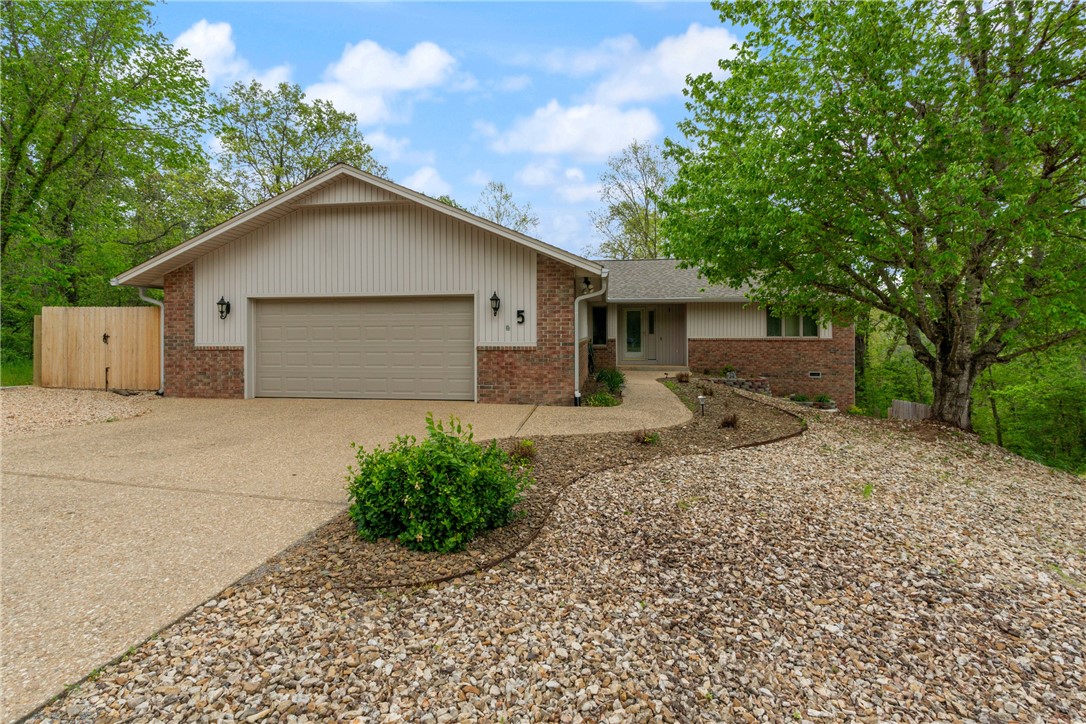 This home, built by Frank Burr, sits on an oversized lot (.42 acres) and is located in a quiet cul-de-sac. It is close to Loch Lomond and with easy access to I-49. This home features a 264 sq ft four-season sunroom. Dual propane/heat pump that was installed in April 2021. Roof was replaced in June 2022. Septic cleaned February 2023. 12 x 20 heat/cooled workshop. 24 x 28 oversized garage. New flooring, paint and appliances 2023. Fully fenced backyard with large gate with potential for off-street parking 2024.