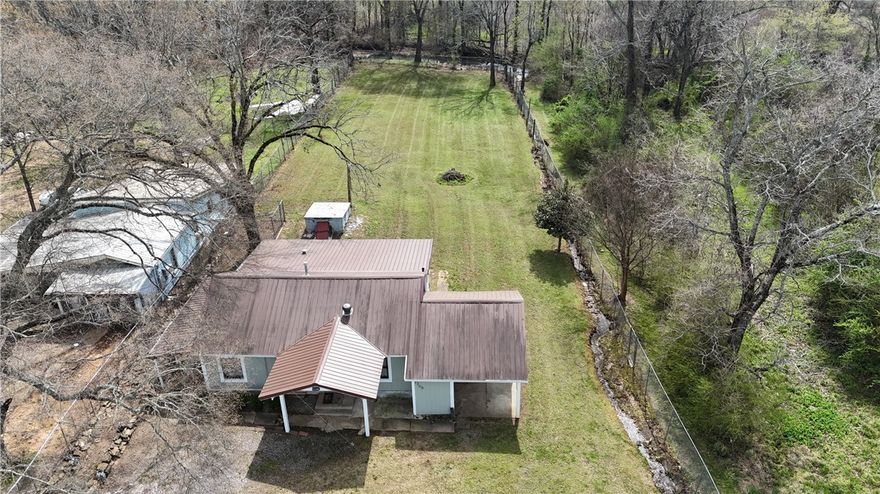 Located on East Main Street in Clarksville, this property offers both convenience and opportunity in a highly accessible location. With close proximity to shopping, dining, and everyday essentials, it makes daily living simple and efficient. The property provides flexibility for a variety of uses, making it a great option for buyers looking to personalize a space or invest in a well-positioned location. Whether you are looking for your next home, a place to start fresh, or a property with potential, this one offers a strong foundation in a central part of town.