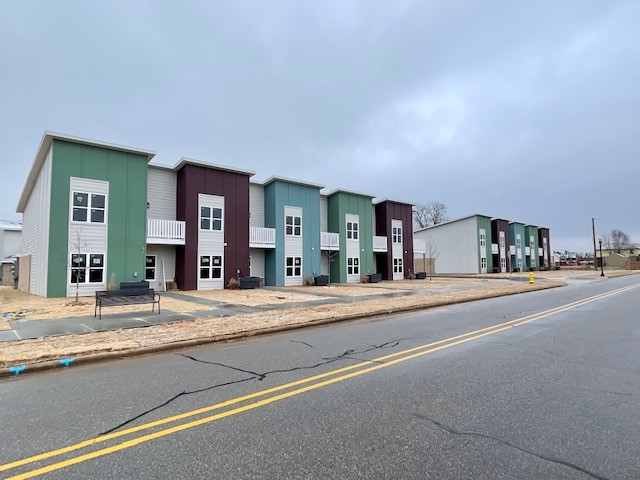 Wonderful townhomes are in an Excellent location with lawn Care Provided. Additional amenities include Granite countertops, wood floors in living room, ceramic tile in all wet areas with carpet in the bedrooms, master bedroom balcony and ALL Appliances Included, yes that means washer and dryer too!