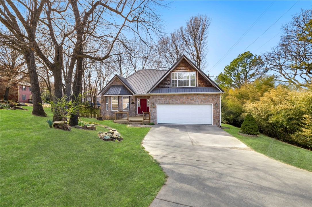 Discover this custom-built home in Sunset Woods, a private POA subdivision in the heart of Fayetteville, complete with a swimming pool, tennis court, and walking trail. Located near the University of Arkansas, this home offers one bedroom plus a bonus room that could easily be a second bedroom, and a spacious primary bathroom. Outside, you’ll find a deck and a fenced-in yard, enhancing the home’s charm and perfect for entertaining. This unique, meticulously maintained home boasts a newer roof and is a must see!