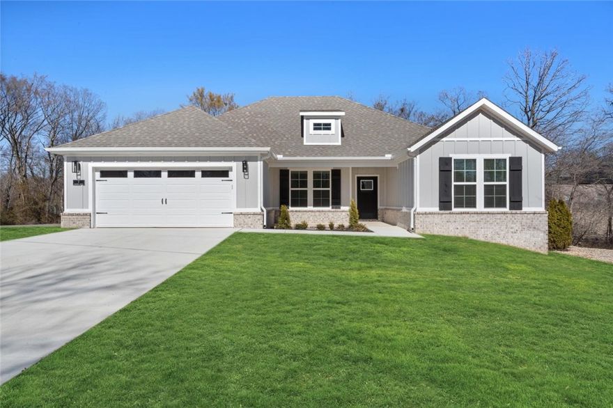 This one is a must see! Beautiful new construction home on a generous .35 acre CORNER lot! Perfectly situated just minutes from Lake Loch Lomond, Highlands Golf Course, Branchwood Community Center, and provides quick access to I-49, this property offers both convenience and access to nature. Inside, you’ll find a well-planned split floor design with 3 Beds + Office, 2 bathrooms and elegant finishes throughout. The open living space highlights vaulted ceilings with striking beams that add warmth and character. The kitchen is designed with quartz countertops, a gas range, custom cabinetry, and sleek black stainless appliances. The primary suite is a relaxing escape, featuring a spacious walk-in closet, a custom tiled shower, and soaking tub. Step outside to enjoy the covered deck, ideal for unwinding or entertaining. Blinds and gutters included! Ask your agent about the builder’s preferred lender credit. 3 BR Septic.