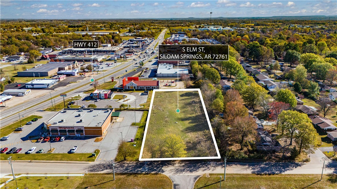 Prime Development Opportunity in Siloam Springs!
Unlock immense potential with this exceptionally located parcel near Hwy 12, offering high visibility and unparalleled access to a thriving community. This gateway to growth in Siloam Springs is ideal for a variety of ventures. Preliminary concepts demonstrate the ability to construct a substantial building up to 12,500 square feet, easily accommodating diverse uses like retail, office, or medical. With an generous parking ratio of 1/200sf (even exceeding the highest code requirements for maximum flexibility!), you'll have ample space for customers or employees. Consider the cost-saving advantage of designing under 12,000sf to potentially avoid sprinkler system costs. This site is perfectly poised for your next successful project! Seller financing available