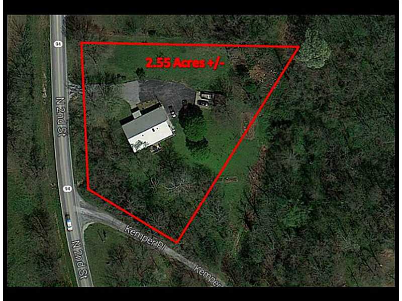 Property was damaged by fire, however, the kitchen (which was remodeled prior to the fire is in good shape.) Opportunity here to own a good property in need of work but sits on 2.55 acres, near all amenities, yet serene with country like setting.,Property sells "as is."