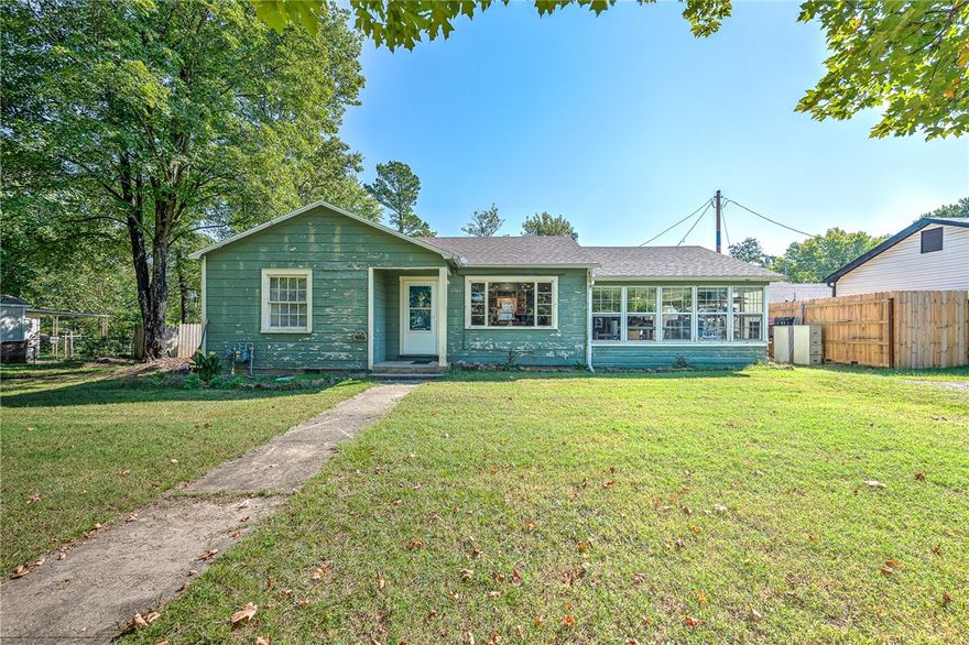 Welcome to 1766 N Janice Avenue, a charming ranch-style home that pairs timeless appeal with sweeping yard space, all just minutes from the University of Arkansas. This renovated gem offers the perfect blend of character and convenience in one of Fayetteville’s rapidly growing neighborhoods. Key Features & Upgrades  1 bedrooms, 1 bath, ~1219 sq. ft. of well-laid out living space, built in 1956. A host of major renovations have been completed and are in process to bring modern systems up to standard: all-new plumbing, updated electrical, and a French drain system to ensure excellent foundation and drainage. Original hardwood (maple) floors and wood details add warmth and authenticity, balanced by neutral finishes that let you bring your own style throughout the home. Living & Outdoor Spaces The single-story floor plan flows well, allowing natural light in from multiple directions. Ideal for both relaxed daily living and entertaining friends or family. Step outside to the large backyard sitting on roughly 0.4 acres