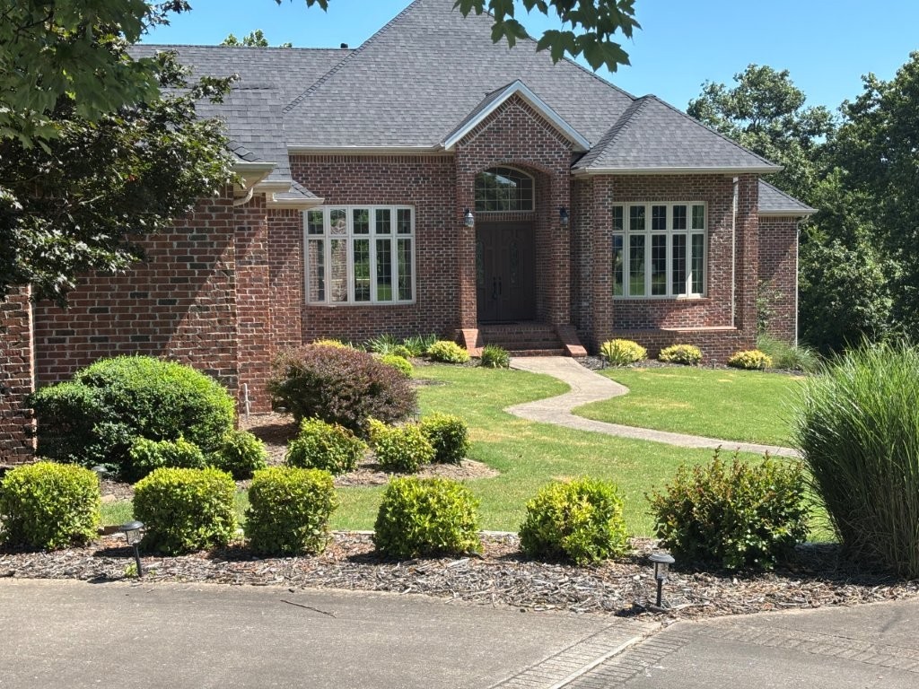 Welcome to this elegant single-level home with beautiful tall windows that accent this landscaped 3.8 AC lot in Talamore Subdivision. Enjoy a large island kitchen w/ newer appliances, walk-in pantry and walk-in wine cooler. Each bedroom with its own full bath. Private backyard with large entertaining deck with views and saltwater pool. Property is 15 minutes to Walmart Headquarters.