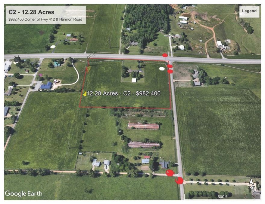 Outstanding commercial opportunity, 12.28 acres with frontage of Hwy 412 West and Harmon Road. Zoned C2 - Very nice 2,375ft home on property that would make a great office. This location is convenient to Hwy 112, I-49, Siloam Springs, Springdale, Fayetteville and all of NWA. Don't miss the opportunity to invest in this awesome deal!