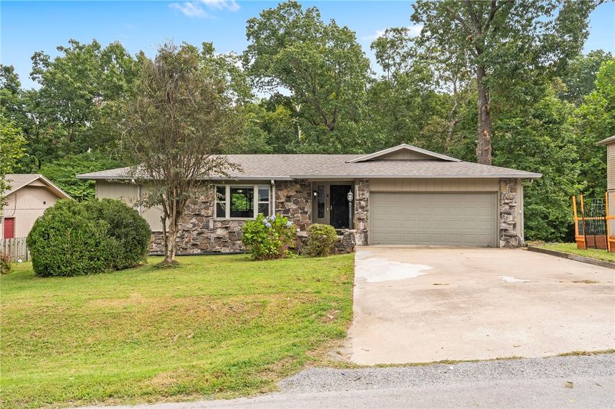 This 3-bedroom, 2-bath home has 1,676 sq. ft. of living space with plenty of room to grow thanks to the unfinished walkout basement. The basement already has a turf room that works perfectly as a home gym, playroom, or hobby space. You'll also love the oversized 2-car garage with extra storage and the fact that there's no carpet anywhere in the home—easy to keep clean and looking fresh.

Out back, the 10x32 covered deck is big enough for hosting friends, grilling out, or just relaxing after a long day. The location is one of the best parts—less than 2 miles from Lake Windsor, Tanyard Springs, Little Sugar trails, golf, dining, and the Kingswood pool. Plus, Harps grocery store and Highway 71 are only 5 minutes away, so you're close to everything you need.

A great mix of comfort, convenience, and potential—you'll want to see this one in person!