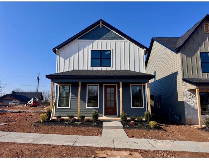 Welcome to the Devon Cottage Home, a thoughtfully designed 3-bedroom, 2.5-bath residence offering 1,742 square feet of functional and stylish living space. The main level features an open-concept living, dining, and kitchen area with 10-foot ceilings, creating a bright and inviting atmosphere ideal for everyday living and entertaining. The primary suite is conveniently located on the main floor and includes a spacious bedroom, walk-in closet, and private bath. Additional highlights on the main level include a powder bath, laundry room, covered front porch, and an attached 2-car garage. Upstairs, you’ll find two additional bedrooms, a full bath, and a central hall that provides privacy and flexibility for guests, family, or a home office setup. This home blends efficient use of space with modern cottage-style charm and low-maintenance living in a desirable community.