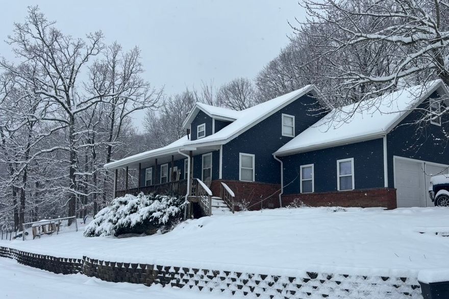 Welcome to hunter's paradise! This recently updated 5-bedroom, 2.5-bath home combines modern style with spacious living, all set on a beautiful 5-acre hunter's dream property. Inside, fresh updates enhance the open living areas, including a stylish kitchen with ample storage and a private primary suite with a large ensuite bath. Four additional bedrooms provide plenty of space for family, guests, or home offices. A standout feature is the impressive 80' x 38' four-bay commercial shop offering 352 square feet of heated and cooled space that includes office space or bonus room—ideal for business use, storage, or large-scale projects. The acreage offers endless opportunities for outdoor activities, with endless wildlife or simply enjoying the privacy of country living, all while being move-in ready with thoughtful updates throughout. Only 8 minutes from Fayetteville and one minute to interstate access. Talk about comfort and convenience!