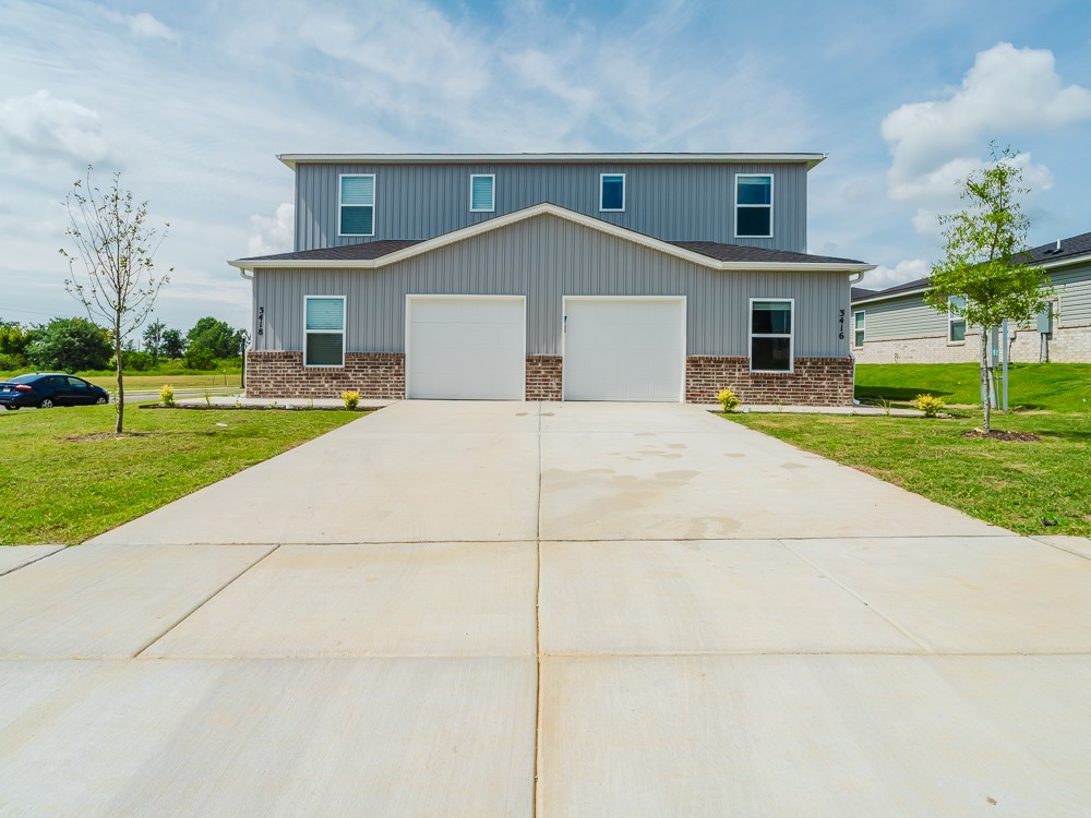 $500 OFF FIRST MONTH'S RENT with move in before Sept 15th! New construction modern townhouse in Hope Hill. Close to schools and new Creekside Park. 3 bedroom, 3 bath on 2-levels. Single car garage with remotes and keypad. Master suite with its own bathroom and large closet is upstairs, along with an additional bedroom, full bathroom, laundry room, and extra storage. Downstairs features a spacious open living area and kitchen as well as an additional bedroom and full bath. Refrigerator, washer, and dryer provided. Small pet considered with additional deposit. All adult occupants must complete application. $50/person to apply. Tenant placement only.