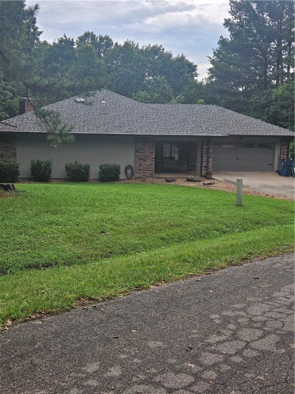 Beautiful private setting within walking distance of Loch Lomand. Seller just spent over 15k redoing kitchen. We have been waiting on workmen for other items such as painting interior and exterior. The septic was originally a 750 gallon tank however it was replaced with a 1250 gallon tank. Presently shown by appointment only till we are finished with the work. We are just about done with the remodeling. Should be ready in about a week. Seller spent 20K on a new HVAC system last year. Also owner has small dogs. Adjacent lot is also available. Professional pictures will follow.