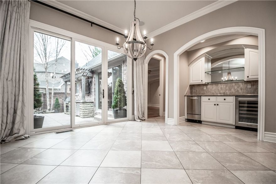 *Wood floors in office/living/dining room were just refinished & cabinets in living room just repainted* Elegant residence located a corner lot on the Northside of Pinnacle Country Club. All four bedroom suites on main level with an additional half bathroom. Large upstairs bonus room w/ full bath and walk-in closet (could be used as 5th bedroom). 11x14 Garage workshop with built-ins (not included in square footage). Top of the line stainless steel appliances in eat-in kitchen with white cabinets. Bar with wine fridge and ice maker. Office & Formal Dining Room. Design elements include: real hardwood flooring, designer lighting, intricate millwork & custom built-ins, marble & granite countertops, & plantation shutters. Luxurious master suite that offers private access to the terrace, marble ensuite bath and walk-in closet. Tranquil outdoor area - covered veranda with wood burning fireplace, full outdoor kitchen & in-ground gunite spa with waterfall. All TVs convey. Agent Owned.