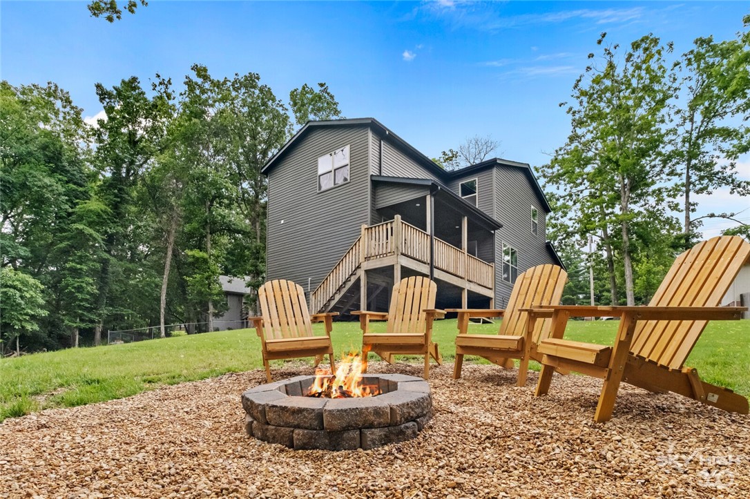 You will feel right at home in this fully furnished & cozy 3 bed, 2.5 bath house, complete with a garage, spacious kitchen, and a relaxing back porch. Nestled in a quiet cul-de-sac and surrounded by nature, it's the perfect mid-term stay. The garage is equipped with a bike rack for your convenience. This home is ideally located near bike trails, lakes, golf courses, grocery stores, pharmacies, a hospital, and local dining. Just 0.2 miles from the Back 40 Trail, you have quick access to Blowing Springs Park, The Gear Garden, the Razorback Greenway & the iconic Wonderland Trail System. Back yard is fully fenced with a fire pit for the cool fall evenings. Conveniently located 7 miles to Bentonville. 3 month lease term is desired. Pets allowed with pre approval and additional fee.