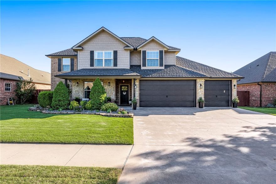 This beautiful home located in the Oxford Ridge neighborhood blends style, function, and Bentonville living at its best. Located just minutes from the Bentonville Community Center, neighborhood parks, and public schools, it offers an inviting open layout with two bedrooms on the main level, hardwood floors, crown molding, and large windows with abundant natural light. The kitchen opens seamlessly to the living and dining areas, creating the perfect space for everyday living and entertaining. Enjoy smart home features including security and irrigation systems, smart locks, and multi-room audio system. The private home office with custom built-ins makes working from home easy, while the extended covered patio with a natural gas hookup and lush landscaping is ideal for outdoor gatherings. Upstairs, a spacious bonus room with wet bar, microwave, and mini fridge adds endless flexibility for guests, media, or play.  Enjoy neighborhood amenities such as a clubhouse, playground, and pool.  This one truly has it all!