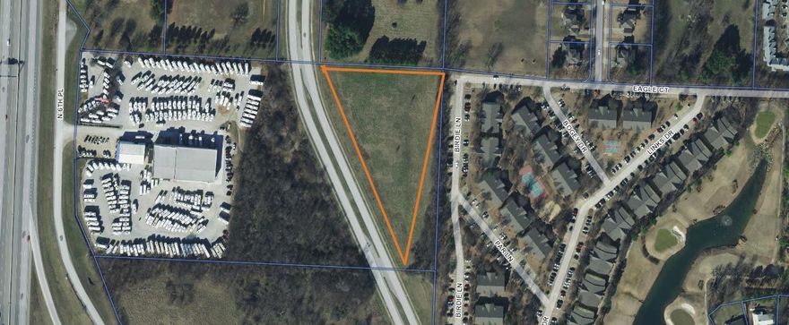 Prime location for development!! Down the street from Fast Lanes and and Defy sports in a booming commercial area. Directly behind Gander RV. Right off of I49. Water and sewer ready.