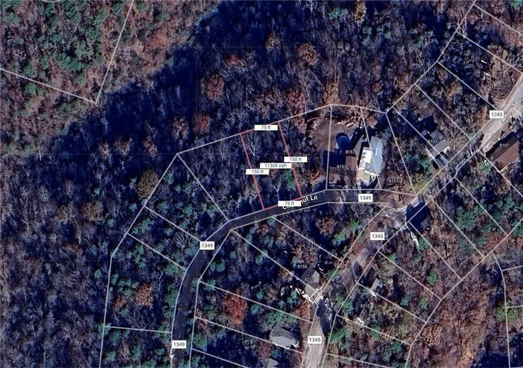 Beaver Lake area lot in the Beaver Shores Subdivision. Very Secluded with a few houses on the street. Prairie Creek Marina and 3 other boat launch ramps located just right around the corner. Minutes to Downtown Rogers. Water and electric at street.