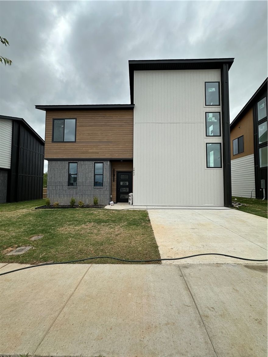 Seller offering $5,000 credit toward closing costs or upgrades. Preferred lender offers a 1% credit on the loan amount, applicable toward closing costs, upgrades, down payment, or other eligible expenses. Enjoy an upscale, low-maintenance lifestyle just over a mile from Pinnacle Hills Promenade and only 2 miles from the Walmart AMP. Residents enjoy top-tier amenities including a saltwater pool, a clubhouse with a kitchen & gym, pickleball court, dog park, playground, paver streets, and bike paths. Live carefree with all lawn care and landscaping managed by the HOA, so you can spend more time enjoying your home and community. Each home features custom architectural design and high-end finishes, including Quartz countertops, cabinets with soft-close hardware, and a curated palette of White & Gold or Black and White for a bold, modern look. Each home is equipped with modern interior fire sprinkler system, providing enhanced safety.