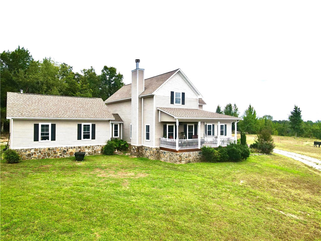 48 Acres m/l with 2640 sq ft custom built home & approximately 704 sq ft separate guest house. The main home has 3 bedrooms, 3 full bathrooms, one 1/2 bath, garden tub, heated floor in the master bath w/thermostat & timer, granite countertops throughout, walk in closets, sunroom, 2 car garage, fireplace, covered front porch, and beautiful Mountain Viewās. The property has year around springs, 2 ponds, barn, shed, pasture, woods , and wildlife.