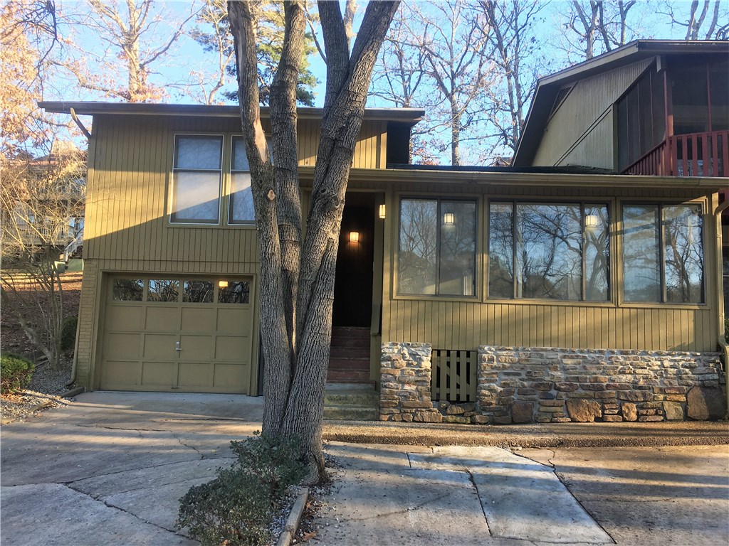 Beautiful Townhouse, off the bike trail in Bella Vista, with three bedrooms and two bathrooms. Features include a large living area with a heated and cooled attached sunroom. Kitchen opens to living area with granite counters and all appliances including dishwasher, stove, microwave and fridge. All bedrooms on one level. Big bonus room featuring washer and dryer across from the attached oversized one car garage. Bonus room could be a bedroom, office or playroom. Fresh updates with new paint and flooring!