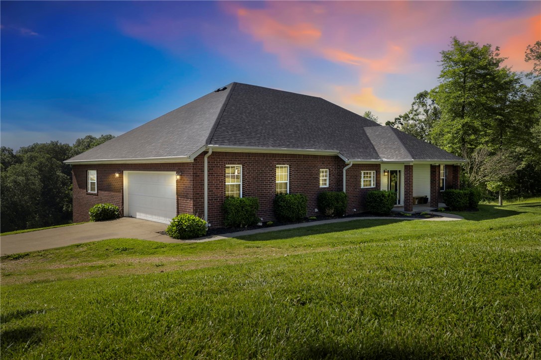 Experience country living on over five acres of tranquil countryside in this stunning 5-bedroom, 5-bathroom property with 4,526 sq ft of comfort and style. Built in 2008 and updated in 2023 with a new roof and HVAC system. It features a fully finished walk-out basement (currently set up as a home gym) that provides generous additional living and/or entertaining areas, while the enormous top floor offers endless possibilities. Step onto the deck and take in breathtaking views providing a serene backdrop for morning coffee or evening gatherings. Spacious, light-filled interiors flow effortlessly, perfect for entertaining or unwinding in style. The circle drive offers plenty of parking with easy access in and out. If you're craving privacy, space, and a slice of countryside peace, this place checks all the boxes. Be sure to check out the 3D Matterport tour.