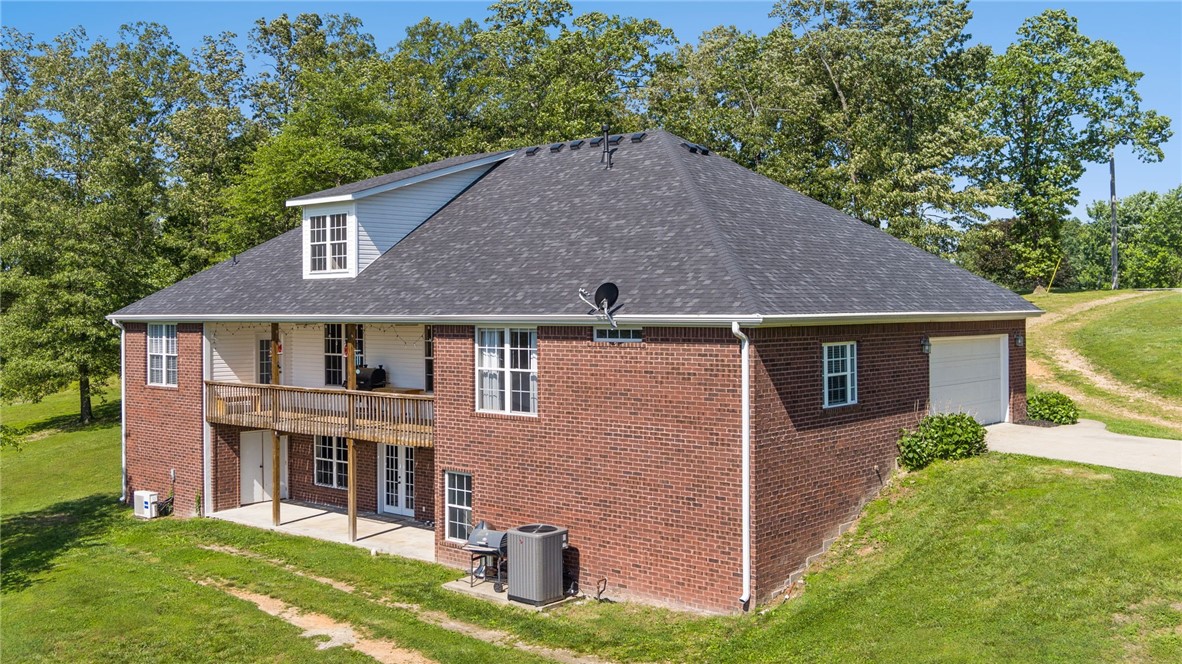 Experience country living on over five acres of tranquil countryside in this stunning 5-bedroom, 5-bathroom property with 4,526 sq ft of comfort and style. Built in 2008 and updated in 2023 with a new roof and HVAC system. It features a fully finished walk-out basement (currently set up as a home gym) that provides generous additional living and/or entertaining areas, while the enormous top floor offers endless possibilities. Step onto the deck and take in breathtaking views providing a serene backdrop for morning coffee or evening gatherings. Spacious, light-filled interiors flow effortlessly, perfect for entertaining or unwinding in style. The circle drive offers plenty of parking with easy access in and out. If you're craving privacy, space, and a slice of countryside peace, this place checks all the boxes. Be sure to check out the 3D Matterport tour.