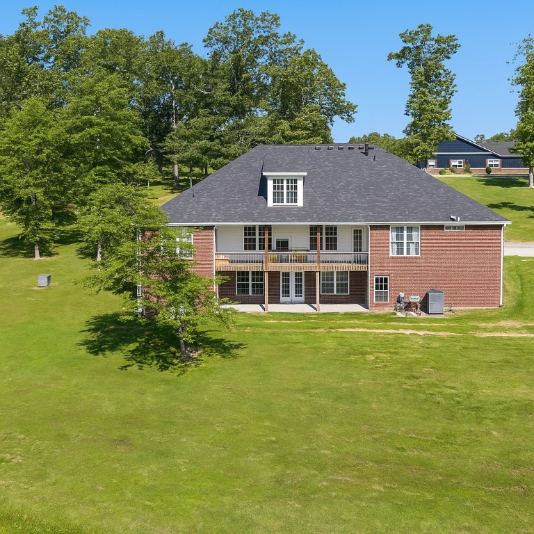 Experience country living, but only 30 minutes from Springdale & Fayetteville. This house sits on just over five acres, with 5-bedroom, 5-bathroom and 4,526 sq ft. You are not going to be able to find this much space at this price anywhere in NWA. Built in 2008 and updated in 2023 with a new roof and HVAC system. It features a fully finished walk-out basement (currently set up as a home gym) that provides additional living and/or entertaining areas, while the top floor offers endless possibilities. Step onto the deck and take in breathtaking views providing a serene backdrop for morning coffee or evening gatherings. Spacious, light-filled interiors flow effortlessly, perfect for entertaining or unwinding. The circle drive offers plenty of parking with easy access in and out. If you're craving privacy, space, and a slice of countryside peace, this place checks all the boxes. The most recent appraisal valued the house at $600,000, tons of equity already! Be sure to check out the 3D Matterport tour & peep added photos