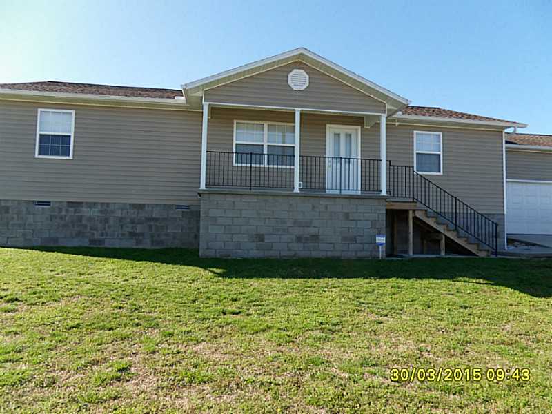 Very nice newer home built in 2012. Large backyard with privacy fence. Cement storm cellar under front porch. Large open living room, dining room kitchen. Monotronics alarm system with digital panel installed and will transfer. Backyard is wired for dog,control. Nice large utility room. Very nice kitchen appliances. Energy Efficient. This will make an awesome starter home. Nice neighborhood and very nice view!