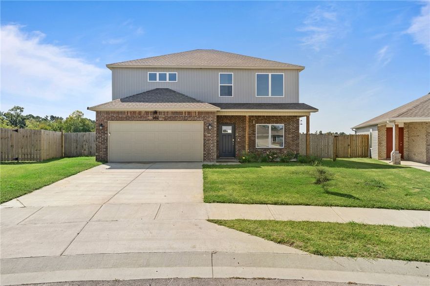 This 2024-built home is more than just a house; it's the Rogers lifestyle you've been waiting for! Located in one of the city’s most desirable neighborhoods, this property offers the best of both worlds: a tranquil residential feel with urban amenities just a short walk or bike ride away. The interior features a bright and airy open-concept layout that’s perfect for both daily life and hosting. The chef-inspired kitchen boasts granite countertops, stainless steel appliances, and custom cabinetry. With four spacious bedrooms, including a main-level primary suite with an en-suite bathroom and large walk-in closet, there’s no shortage of space. The backyard is an absolute gem, completely fenced in, featuring a built-to-last, reinforced concrete patio that is already wired and ready for a hot tub. This thoughtful detail makes it effortless to create your perfect outdoor sanctuary. This home is a rare find in a prime location.