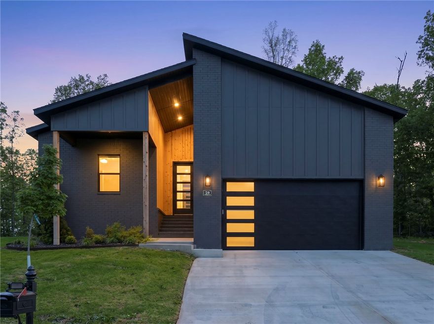 New construction near Loch Lomond, Stoneykirk boat launch, and Branchwood Rec Center (indoor pool, fitness center, pickleball). Easy access to trails, lakes, and outdoor recreation. Open-concept layout with granite countertops, stainless steel appliances, walk-in pantry, and eat-in kitchen. LVP flooring and great natural light throughout. Covered back porch with level backyard. Features include hot water recirculation system, fully insulated garage, professional landscaping and amazing curb appeal. 2-year builder warranty included. $3,500 credit with preferred lender.