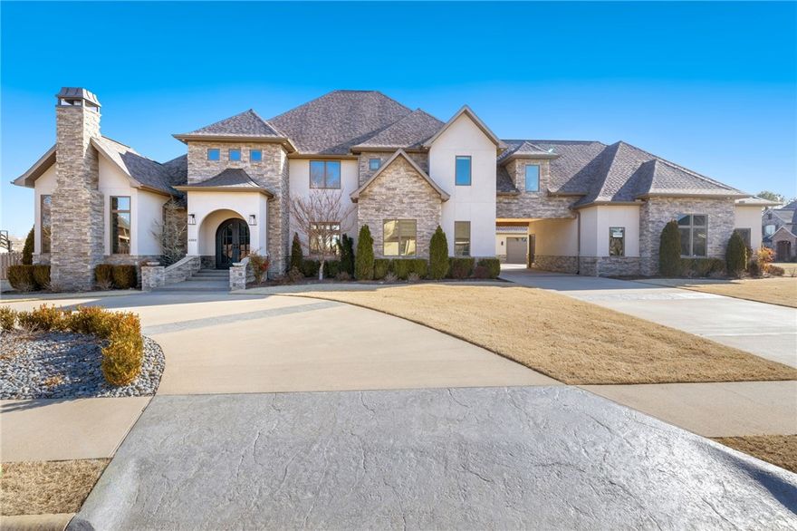 This 5-bedroom Dream Home in St Valery Downs gated community offers unparalleled luxury. Each bedroom features an en-suite bath, and the home includes two powder rooms, a dedicated office, a spacious mudroom, and a formal dining room. A bonus room, a theater room, and an open-concept kitchen/living area provide ample space for entertainment. The captivating entertainment room, complete with a professionally remodeled bar, flows seamlessly to a serene outdoor oasis with a heated saltwater pool and hot tub. The home, designated for effortless entertaining, also boasts a media control system and a secure tornado shelter.