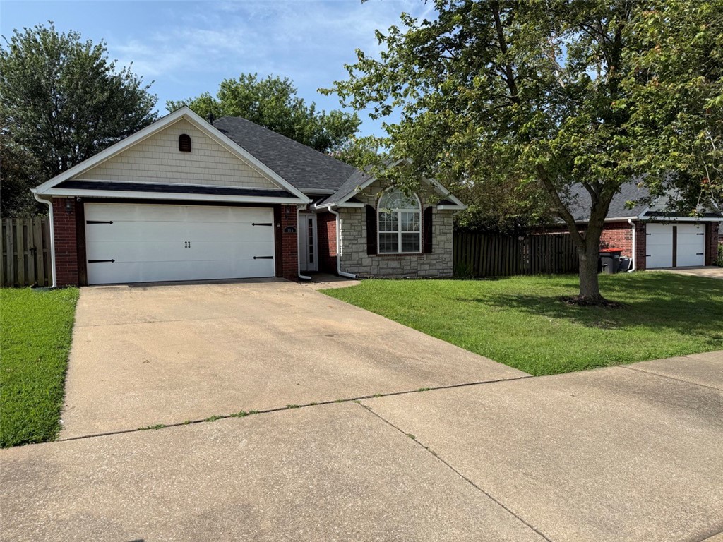 This inviting 3-bedroom, 2-bath home offers 1,402 square feet of thoughtfully designed living space. The layout features a spacious living area, a practical kitchen and dining space, and well-proportioned bedrooms that provide flexibility for any lifestyle. All appliances will convey including a double-door refrigerator, washer and dryer, glass-top range with double oven and an above the range wall-mounted microwave offering added convenience. The property also features a two-car garage and a manageable yard, making it ideal for easy, everyday living. Located in a quiet neighborhood with easy access to local amenities, this home is ready for its next chapter. Schedule a tour today to see if this home is the right fit for you.