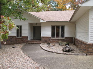 Quiet Country Setting in Hot Springs Village, this home has all stainless steel appliance, fireplace, screened in porch, deck with privacy and gas grill,3 bedroom, 2 baths, garage. $140,000.