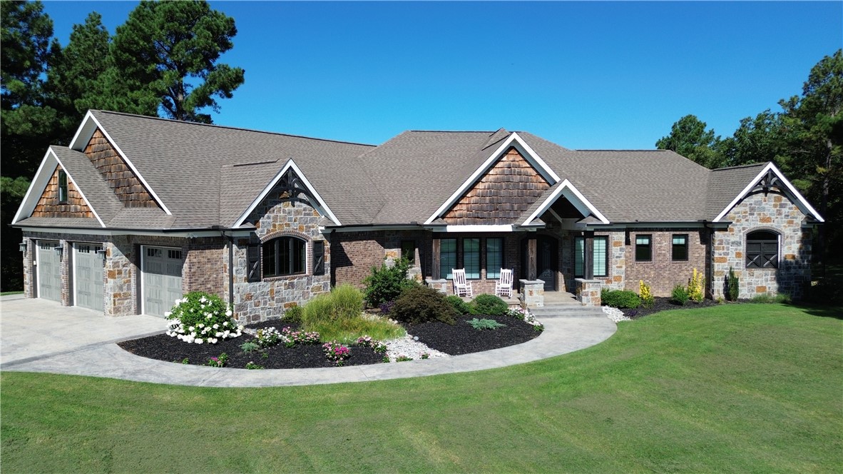 If you are looking for a home that has it all, look no further. This custom built home was made for luxury,
comfort, and energy efficiency. From top to bottom, there is not a detail that was spared in this gorgeous
home. With over 6500sf, this stunner boasts 8 Bedrooms, 4 full bathrooms, 2 half bathrooms, 2 living
spaces, sun room, media room wired for a projector, 2 kitchens, outdoor kitchen, safe room, and with almost 5 acres.....This home really has it all. Energy Efficiency in a home of this size is almost unheard of, but not for this home!!!! A full list of features is in the photos and attachments. Just inside of Huntsville city limits and 25 mins from Fayetteville, 20 mins from Springdale, & 35 mins to Downtown Rogers.....this home is perfect for those who want some privacy but also want to be close enough to all of the happening things in NWA!!!